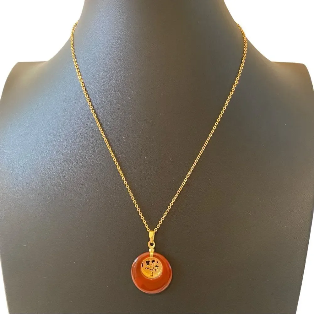 Delicate Looking Vintage Pendant on Shimmering Gold Tone Chain.